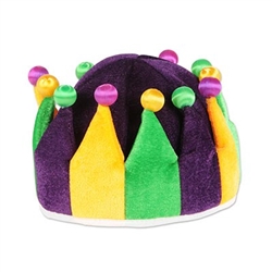 The Plush Jester Crown is purple, golden yellow, and green with contrasting fabric balls on each tip. Made of plush material and measures approx 6 inches high and has an inside circumference of approx 22 inches. One size fits most. One per pack. No return