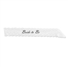 The Bride To Be Lace Sash is made of white lace material with bride to be written in black cursive lettering. Measures 4 inches wide and 33 inches long. Contains one per package. No returns.