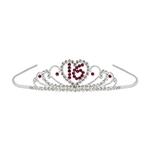 The Sweet 16 Royal Rhinestone Tiara features a silver metal tiara adorned with realistic looking gemstones in an intricate design. A rhinestone heart featuring the number 16 is centered on the front. One per package.