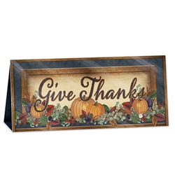 Add a warm and welcoming message to your table with this classic, rustically styled 3-D Foil Fall Thanksgiving Centerpiece.  Fully assembled it stands 6 1/4 inches tall and 131/2 inches wide.  Sure to become a treasured holiday decoration!