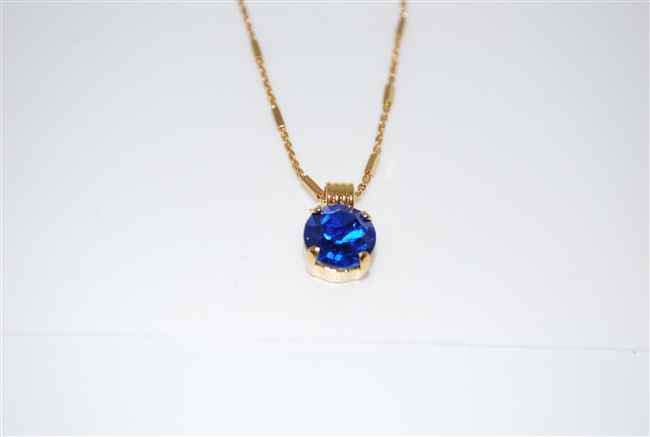 Mariana Pendant with Sapphire Crystal with 16" chain and .925 Yellow Gold Plating