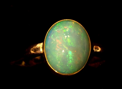 Kevin and Joanne Dowdy Oval Opal/Gold Ring