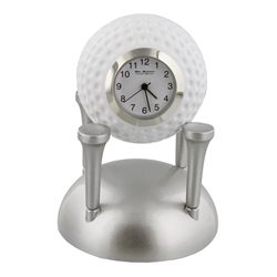 Miniature Clock Golf Ball Sitting On Tees