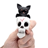 Squeezy Skull And Bat Toy