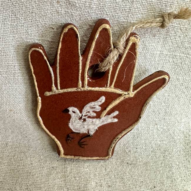 Hand with Dove Ornament $30