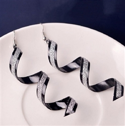 Black swirl earrings with silver glitter
