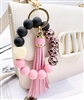 Chunky silicone beaded keychain bracelet with tassel - black/pink