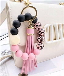 Chunky silicone beaded keychain bracelet with tassel - black/pink