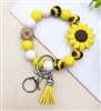 Chunky silicone beaded keychain bracelet with sunflower - black/yellow/white