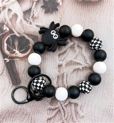 Chunky silicone beaded keychain with spider charm in black and white