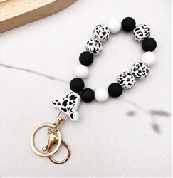 Chunky silicone beaded keychain bracelet - black/white cow