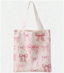 White canvas tote bag with hot pink bows