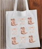 White canvas tote bag with bows and cowboy boots