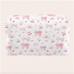 White makeup bag with pink bow print