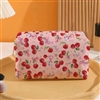 Pink makeup bag with cherry bow print