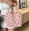 Corduroy pink purse with strawberries