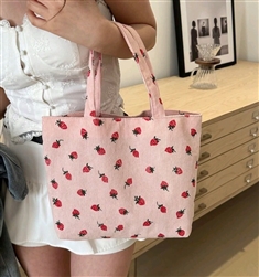 Corduroy pink purse with strawberries