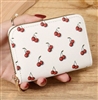 White wallet with red cherry print