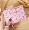 Pink wallet with hot pink bows and hearts