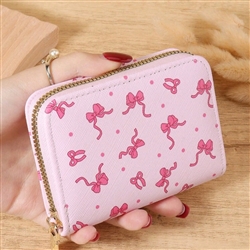 Pink wallet with hot pink bows