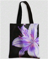 Black canvas tote bag with purple lily