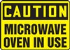 Caution Sign - Microwave Oven In Use