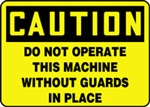 CautionDo Not Operate This Machine Without Guards In Place