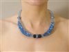 Light blue mesh houses sapphire/black a/b crystals and is accented with blue and black outer beads in 30 Park Rocks handmade choker