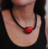 Choker necklace with a dyed nut at center and mesh filled with Czech crystals