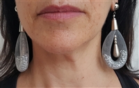 Loop dangle earrings with partial crystal filled mesh