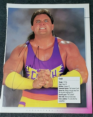 VINTAGE WWF MAGAZINE PAGE signed by CRUSH