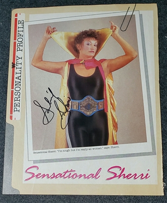 VINTAGE WWF MAGAZINE PAGE signed by SENSATIONAL SHERRI