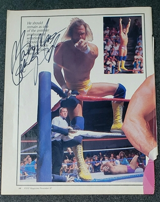 VINTAGE WWF MAGAZINE PAGE signed by RANDY SAVAGE