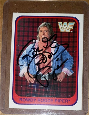 ROWDY RODDY PIPER signed 1985 MERLIN card