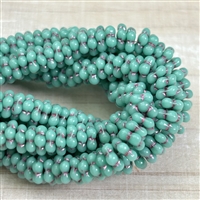 kelliesbeadboutique.com | 5mm Opaque Turquoise with Purple Wash Daisy Spacer Flower Czech Glass Beads